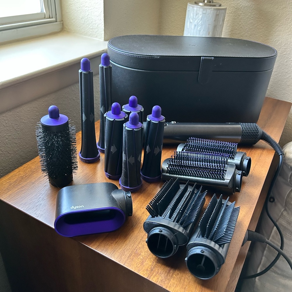 DYSON Air Wrap. EUC. Black / Purple. $350
I